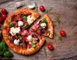 Delicious italian pizza served on wooden table