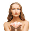 beautiful woman with rose petals
