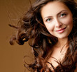 Photo: beautiful woman with perfect curls beautiful woman with perfect curls