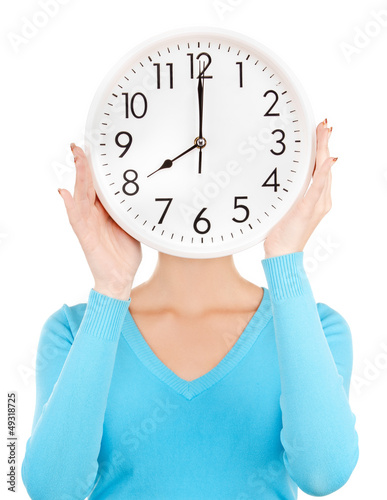 Photo: woman holding big clock woman holding big clock