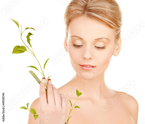Photo: woman with green sprout woman with green sprout