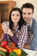 Couple preparing a meal together