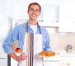 Foto: Young Man Cooking Pizza Young Man Cooking Pizza
