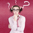 School Girl Looking Up At Question Mark Symbols