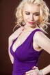Closeup portrait of a pretty young and happy blonde woman