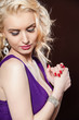 Closeup portrait of a pretty young and happy blonde woman
