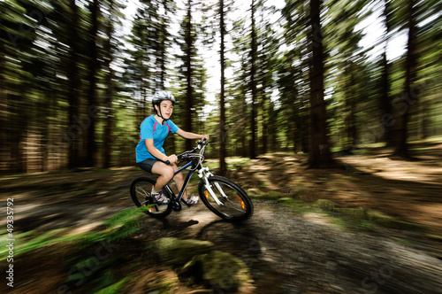 Photo: Girl biking Girl biking