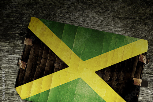 Photo: JAMAICAN FLAG ON WOOD JAMAICAN FLAG ON WOOD