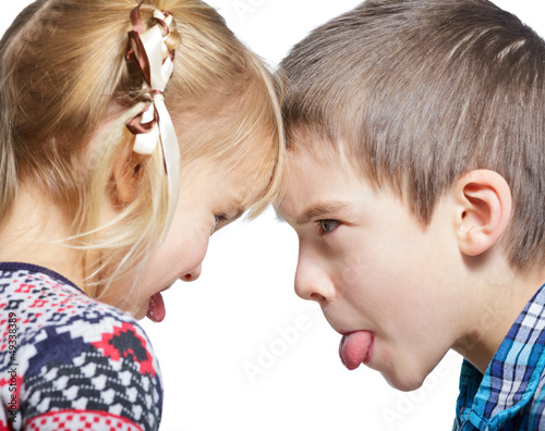 Photo: Children sticking out tongues Children sticking out tongues