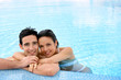 Couple in swimming pool