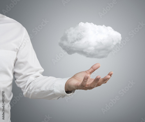 Photo: Cloud computing concept, businessman with cloud over hand Cloud computing concept, businessman with cloud over hand