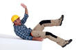 Construction worker falling over
