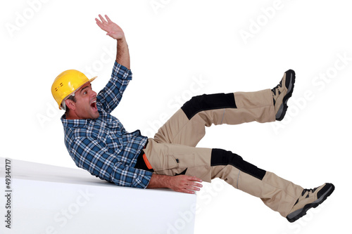 Photo: Construction worker falling over Construction worker falling over