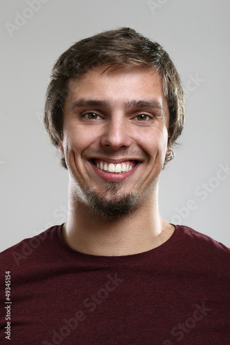 Photo: Young man with happy expression Young man with happy expression