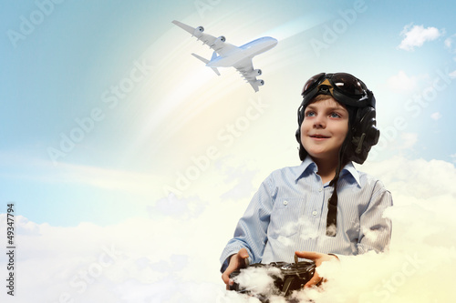 Photo: Little boy in pilot's hat Little boy in pilot's hat