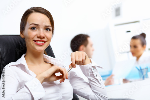 Photo: Young businesswoman in the office Young businesswoman in the office