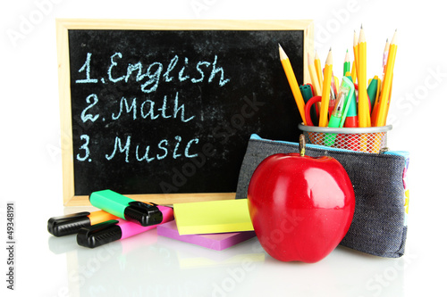 Photo: pencil box with school equipment and timetable isolated on pencil box with school equipment and timetable isolated on