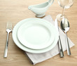 Table setting on wooden table