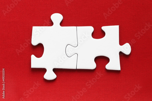 Photo: Jig Saw Puzzle - Two Pieces on Red Jig Saw Puzzle - Two Pieces on Red