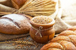 fresh bread and wheat on the wooden