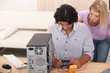 technician repairing a computer