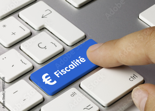 Photo: € Fiscalité clavier doigt € Fiscalité clavier doigt