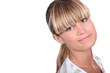 Shy blond female teenager