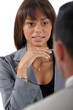 Businesswoman interviewing a job applicant