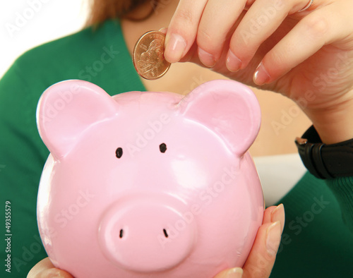 Photo: Unknown woman holding piggy bank (money box) Unknown woman holding piggy bank (money box)