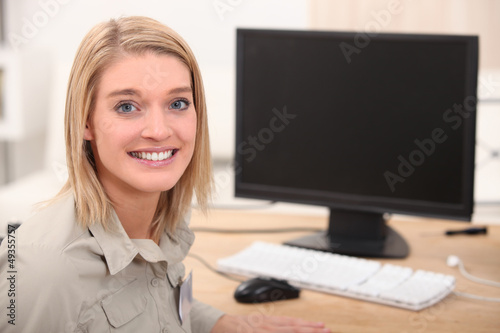 Photo: Female with computer Female with computer