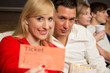 Audience member presenting tickets