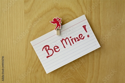 Photo: Valentine concept. Message on a wooden background. Valentine concept. Message on a wooden background.