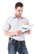 Portrait of a businessman reading a daily newspaper