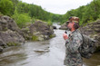 Photo: Backpacker of a mountain river Backpacker of a mountain river