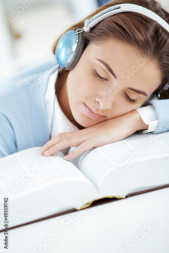 Photo: Sleeping on open book Sleeping on open book