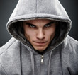 Photo: Close-up portrait of threatening thug Close-up portrait of threatening thug