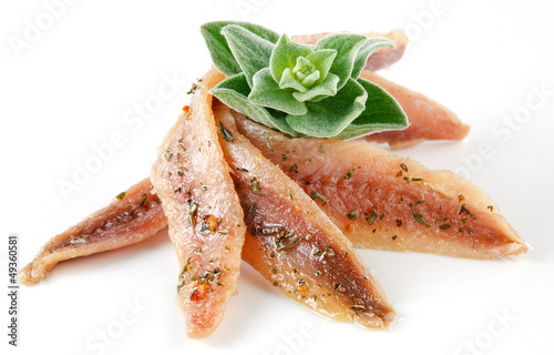 Photo: anchovies on white with spice and oregano anchovies on white with spice and oregano