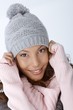Closeup portrait of happy winter girl
