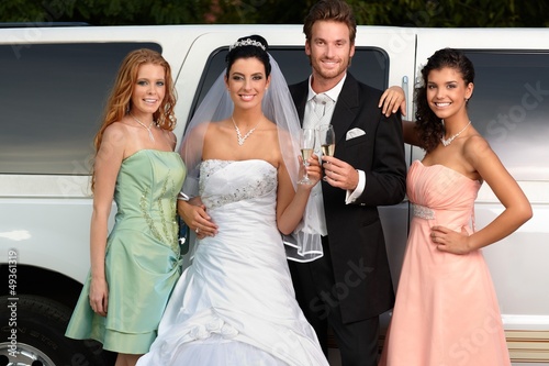 Photo: Engaged couple with bridesmaids Engaged couple with bridesmaids
