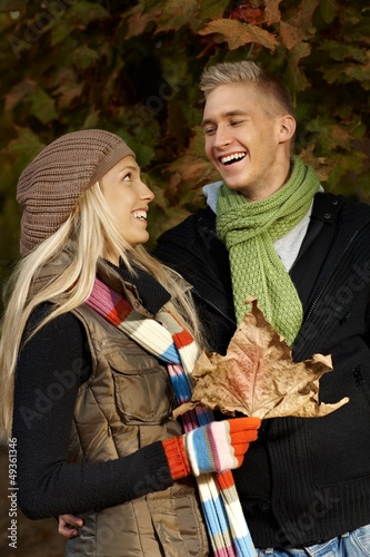 Photo: Happy couple in autumn park Happy couple in autumn park