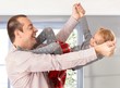 Father and little daughter playing laughing