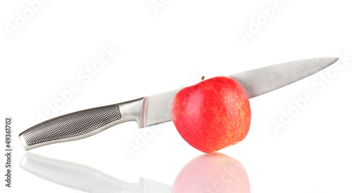 Photo: Red apple and knife isolated on white Red apple and knife isolated on white