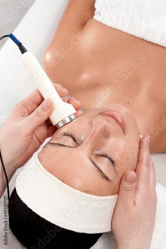 Photo: Young woman at beautician Young woman at beautician