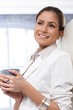 Happy businesswoman at coffee break