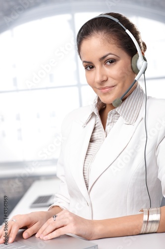 Photo: Confident customer care representative Confident customer care representative