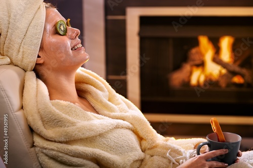 Photo: Smiling woman with facial mask Smiling woman with facial mask
