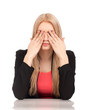 Photo: Business woman covering her eyes Business woman covering her eyes