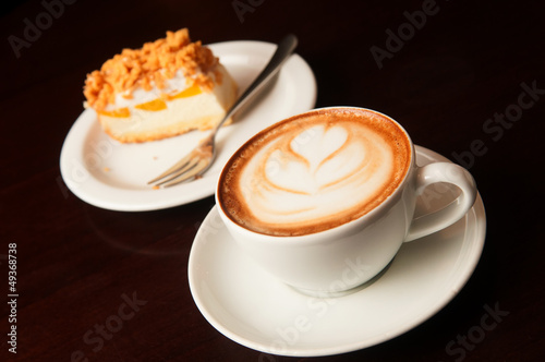 Photo: cappuccino cup with cake cappuccino cup with cake