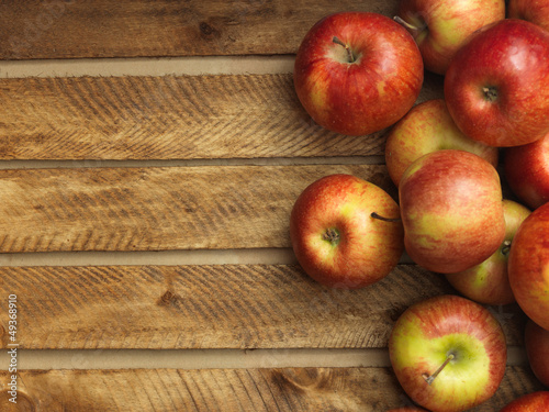 Photo: Red apples in wooden box Red apples in wooden box