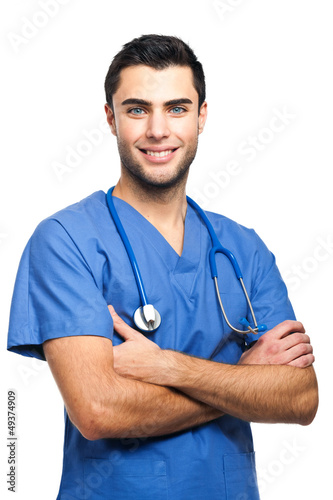 Photo: Male nurse isolated on white Male nurse isolated on white